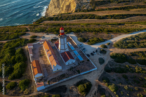 Obraz na płótnie Beautiful drone view of lighthouse, cape Espichel at sunset, Portugal w salonie