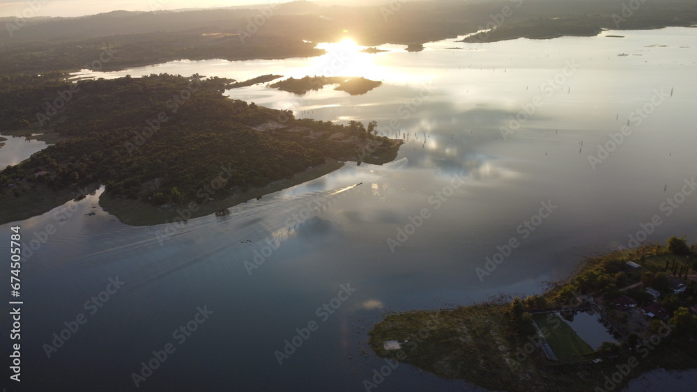 sunrise over the Nam Houm Reservoir lake