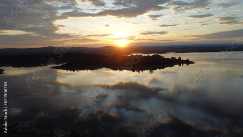 sunrise over the Nam Houm Reservoir lake