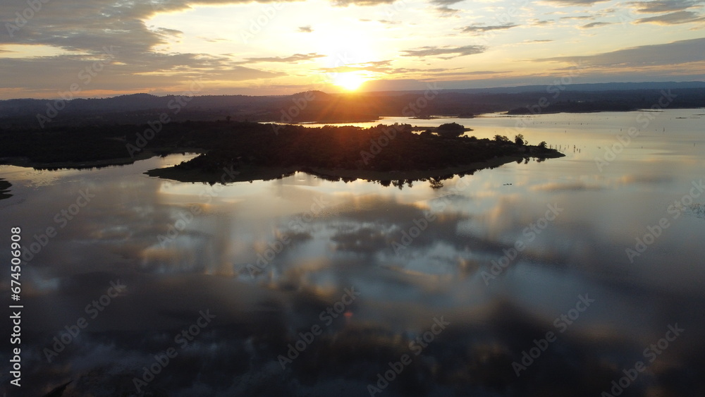 sunrise over the Nam Houm Reservoir lake sunrise over the Nam Houm Reservoir lake