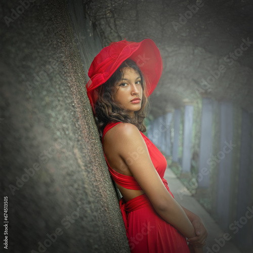 girl in a red dress and hat