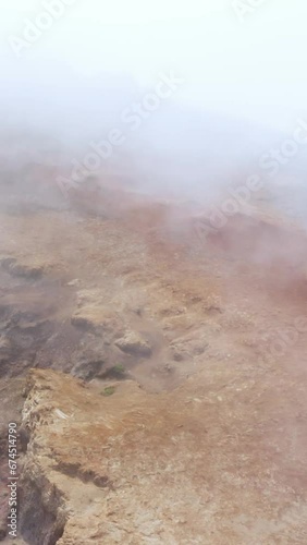 Aerial view of highlands landscape with low clouds on the mountains