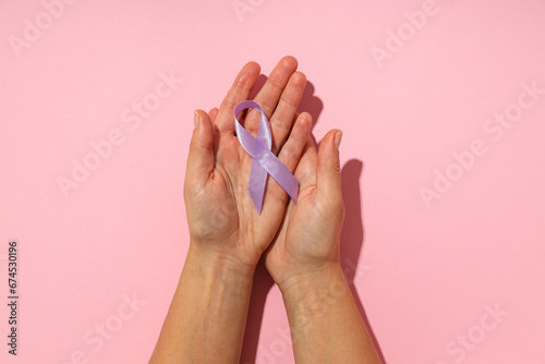 Purple ribbon, concept for the day of elimination of violence against women.
