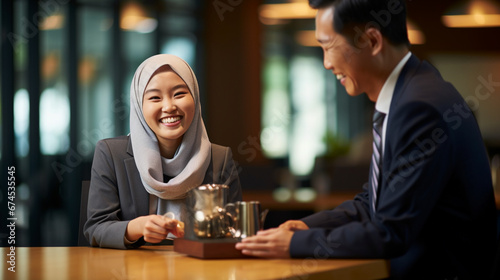 Proud Achievement: Young Asian Female Employee Receives Recognition Award from Senior Colleague, Exuding Confidence and Accomplishment