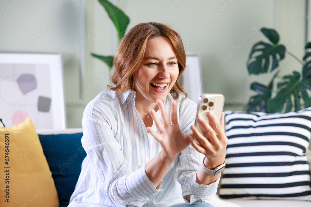 Attractive young woman search and reading a conversation on a mobile phone, networking and texting on a mobile app Attractive young woman search and reading a conversation on a mobile phone, networking and texting on a mobile app