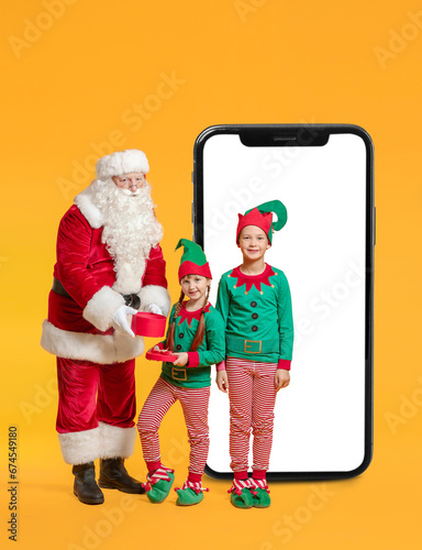 Santa Claus and little elf ...