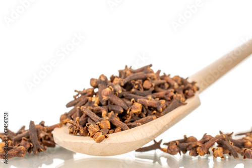 Wallpaper Mural Dry aromatic cloves and with wooden spoon, macro, isolated on white background. Torontodigital.ca
