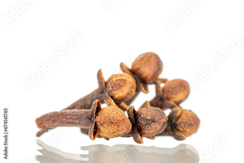 Dry aromatic cloves, macro, isolated on white background.