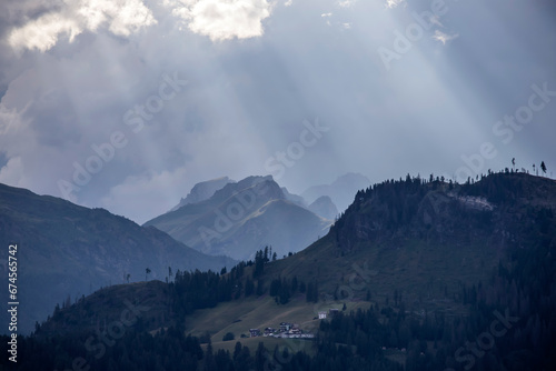 Church in the mountain, in the little town of Selva di Cadore, in the background the peak of Civetta, Dolomites, Italy