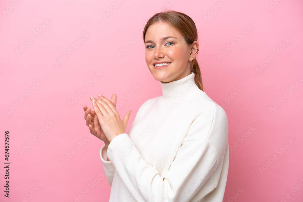 Young caucasian woman isolated on pink background applauding Young caucasian woman isolated on pink background applauding