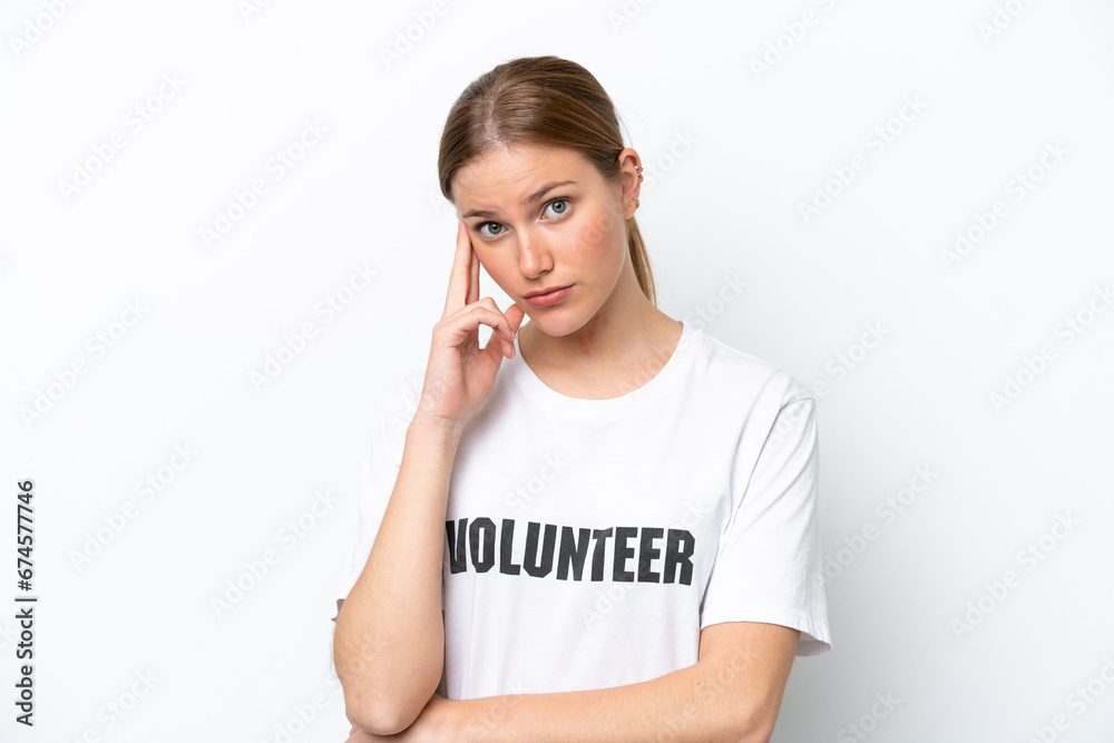 Young volunteer woman isolated on white background thinking an idea Young volunteer woman isolated on white background thinking an idea