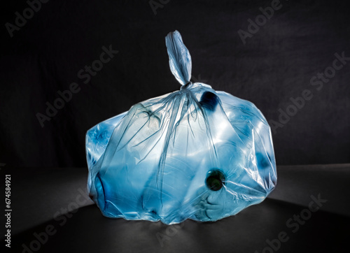 Recycling: plastic bottles in bin liner