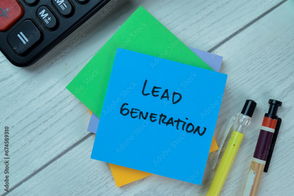 Concept of Lead Generation write on sticky notes isolated on Wooden Table. Concept of Lead Generation write on sticky notes isolated on Wooden Table.