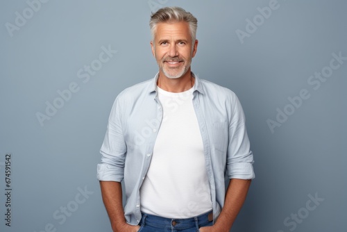 Mature smiling man studio portrait. AI generative