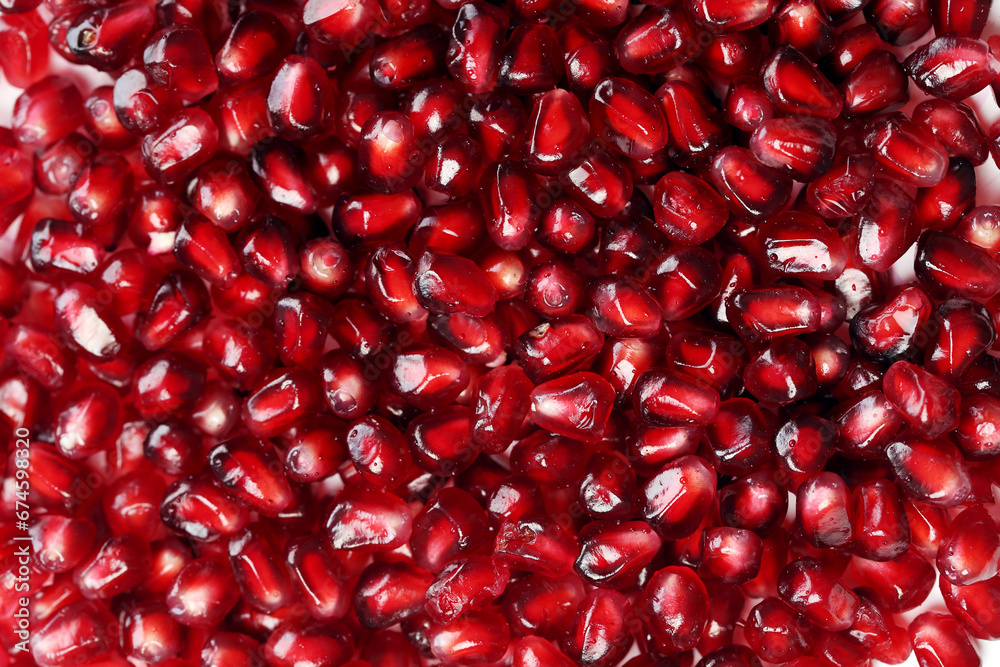 Several ripe pomegranate fruits and an open pomegranate, pomegranate on table, top view, dark background, Fresh ripe pomegranate on black background, selective focus, Healthy pomegranates fruit garnet Several ripe pomegranate fruits and an open pomegranate, pomegranate on table, top view, dark background, Fresh ripe pomegranate on black background, selective focus, Healthy pomegranates fruit garnet