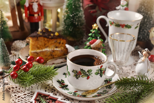 Christmas table with coffee and carrot and apple cake with chocolate glaze