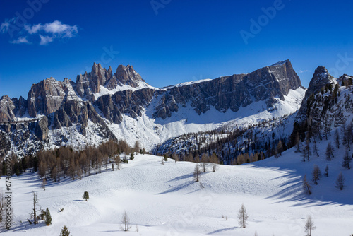 Winter landscape of the Italian mountains. View of Monte Lastoni di Formin. View of the mountains near the Cinque Torri refuge. Particular light  blue intensity.