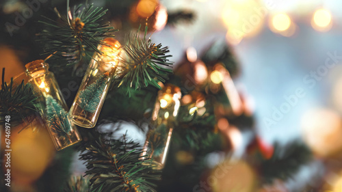 Closeup - Elegant Christmas tree in glass jar with bokeh lights on Christmas tree, Christmas and new year concept. photo