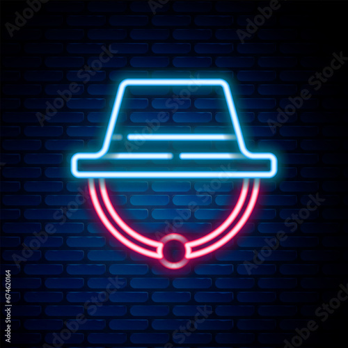 Glowing neon line Camping hat icon isolated on brick wall background. Beach hat panama. Explorer travelers hat for hunting, hiking, tourism. Colorful outline concept. Vector