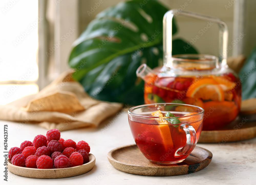 fruit berry citrus tea in a glass teapot fruit berry citrus tea in a glass teapot