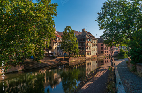 Strasbourg, France. Ancient houses of the Petite France district on the embankment of the Ille River in the early morning.