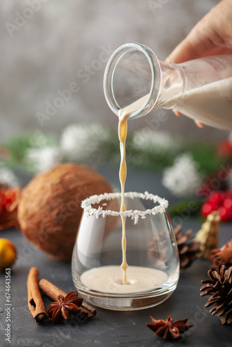 Homemade Puerto Rican Coquito Eggnog for the Holidays. Classic Christmas South American drink photo