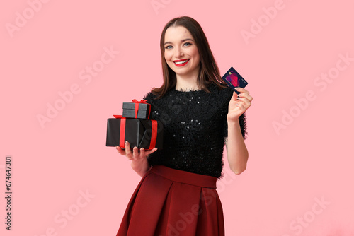 Young woman holding Christm...