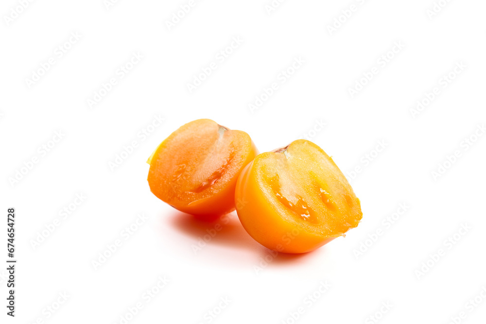 Halves yellow tomato isolated on white background.