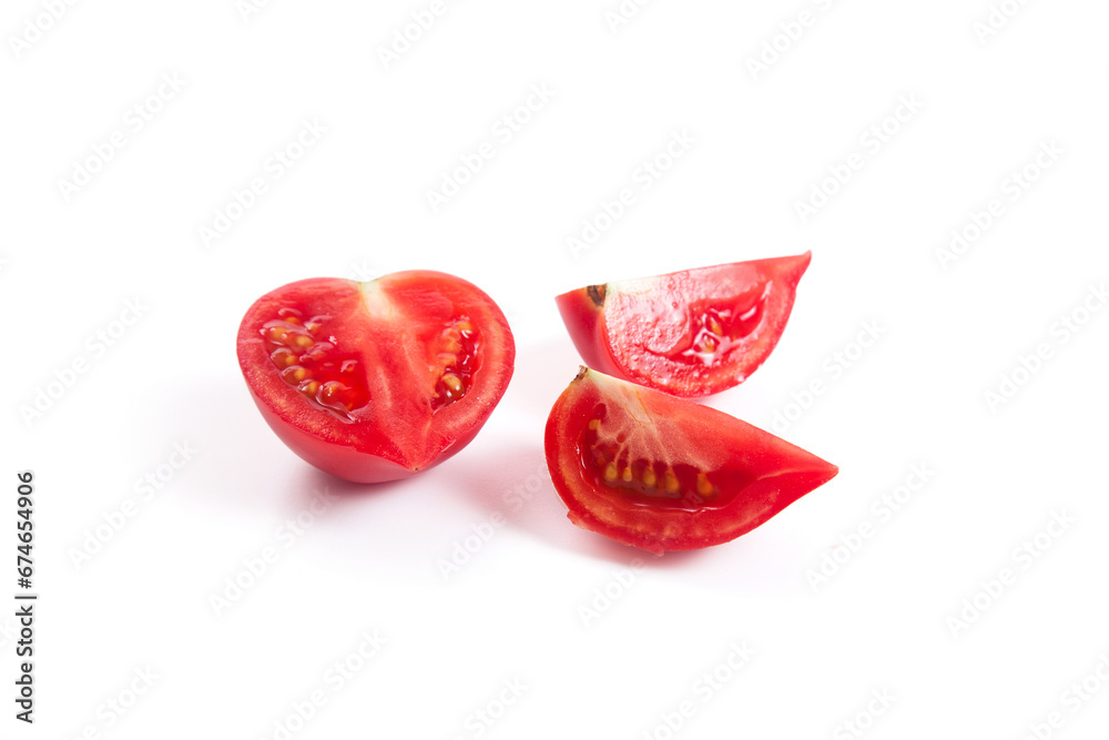 Fototapeta premium Cut pink tomato isolated on white background.