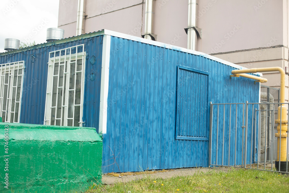 Fototapeta premium Technical building. Boiler room for heating building. Equipment in Blue House.
