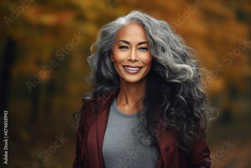 Generative AI technology picture of gorgeous grey haired woman walking autumn park