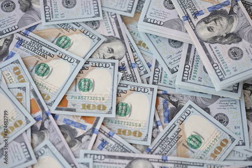 Wallpaper Mural Very big amount of US hundred dollar bills close up. Huge quantity of united states currency notes on flat table Torontodigital.ca