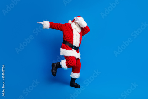 Full length photo of mature pensioner man dub dance cool dressed stylish santa claus costume coat isolated on blue color background