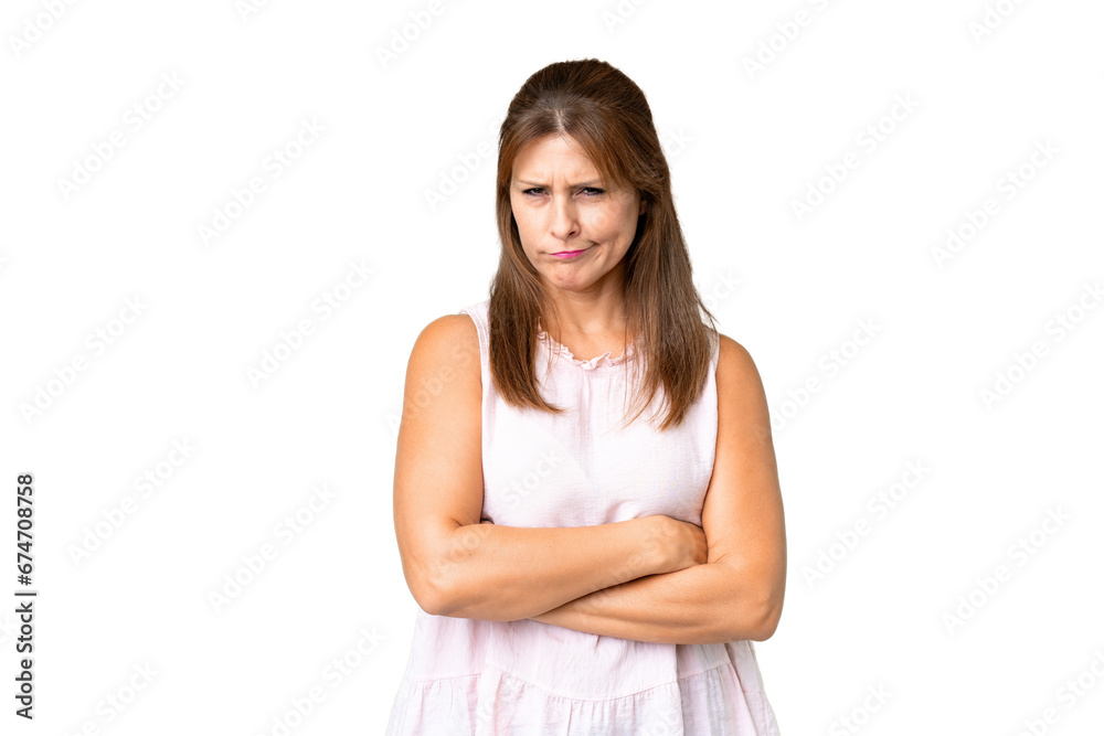 Middle age woman over isolated background with unhappy expression Middle age woman over isolated background with unhappy expression
