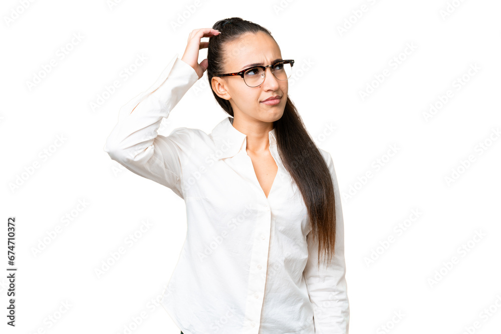 Young Arabian woman over isolated chroma key background having doubts while scratching head Young Arabian woman over isolated chroma key background having doubts while scratching head