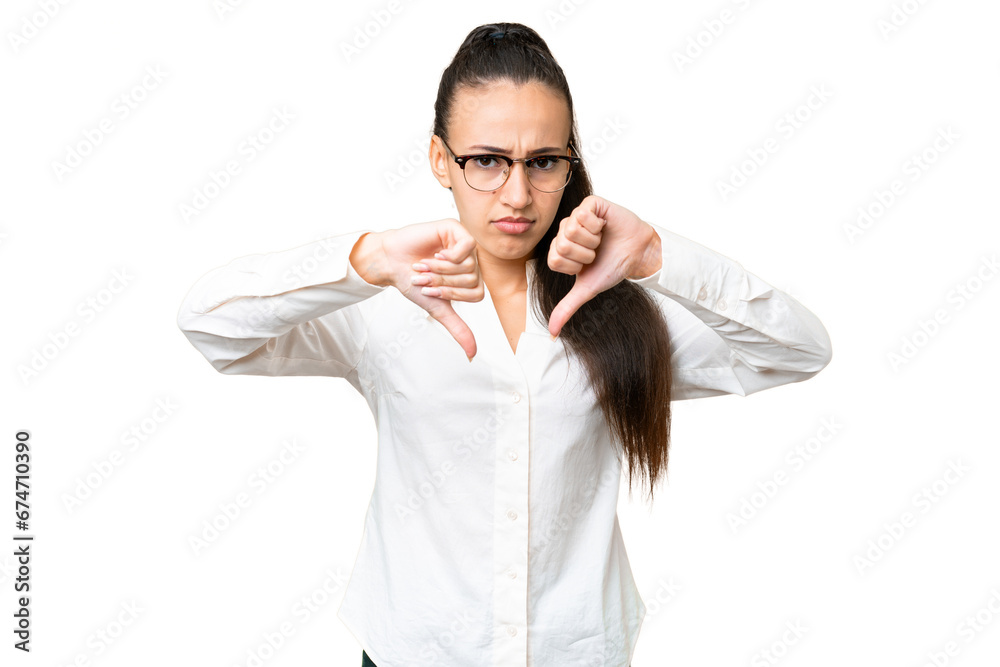Young Arabian woman over isolated chroma key background showing thumb down with two hands