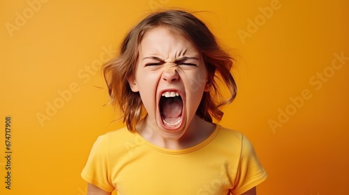 Angry irritated Caucasian girl. Full of rage. Emotional portrait of an upset preteen boy screaming in anger. Requirements for parents. Wrong perception. Hysterics.