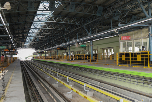 A view of an empty overhead metro train station under construction