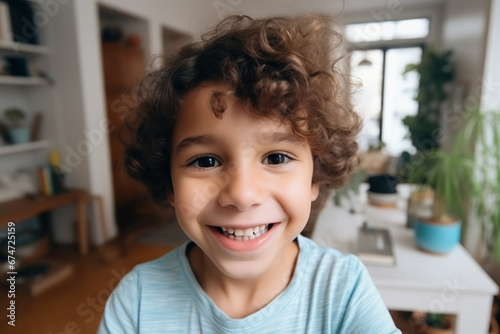Head shot portrait of Caucasian boy at home
