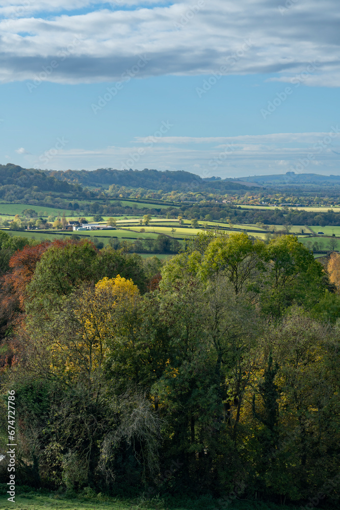 Vista from Burton Dassett Hills on a bright autumnal day with far reaching views over Warwickshire, England