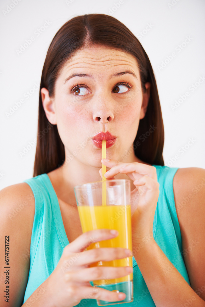 Funny, drink and face of woman with juice for nutrition, wellness and hydration in studio. Beverage, smoothie and thirsty person with fruit blend for vitamins, detox and diet on white background Funny, drink and face of woman with juice for nutrition, wellness and hydration in studio. Beverage, smoothie and thirsty person with fruit blend for vitamins, detox and diet on white background
