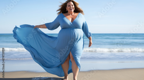 body positive, plus size woman enjoys summer day at the beach