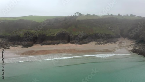 Aerial view of Lundy Bay coastline with beach, Wadebridge, United Kingdom. photo