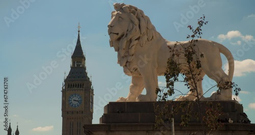 Big Ben, Houses of Parliament and the Lion Statue on Westminster Bridge, London, England