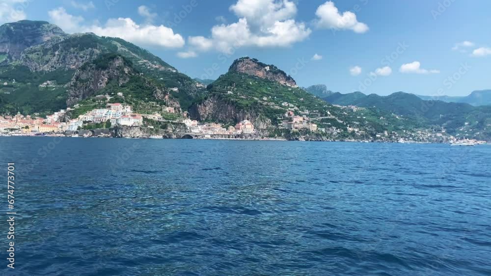 Amalfi coast view at sunrise, Italian seaside near Naples, towns of Amalfi Amalfi coast view at sunrise, Italian seaside near Naples, towns of Amalfi