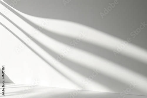 Abstract background with light and shadows. Sun light and soft shadows falling on white wall background