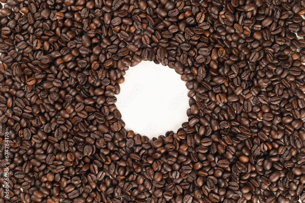 Top view illustration of coffee beans isolated on a white background in a round shape to use for text or advertising. Top view illustration of coffee beans isolated on a white background in a round shape to use for text or advertising.