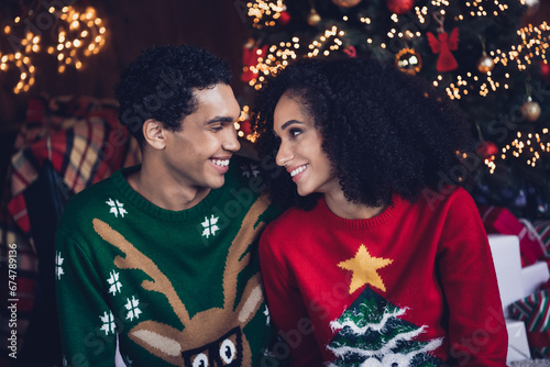 Photo of two people wife husband feel cozy warmth while celebrating new year in lights decor tinsels house indoors