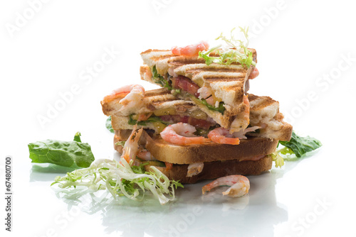 sandwich with lettuce and shrimp.
