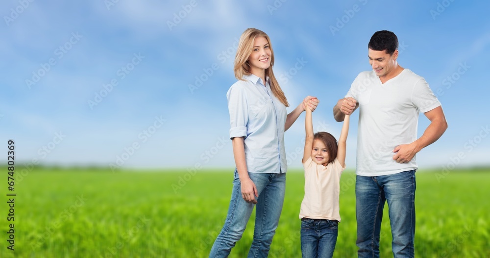 Happy young parents and child walking Happy young parents and child walking